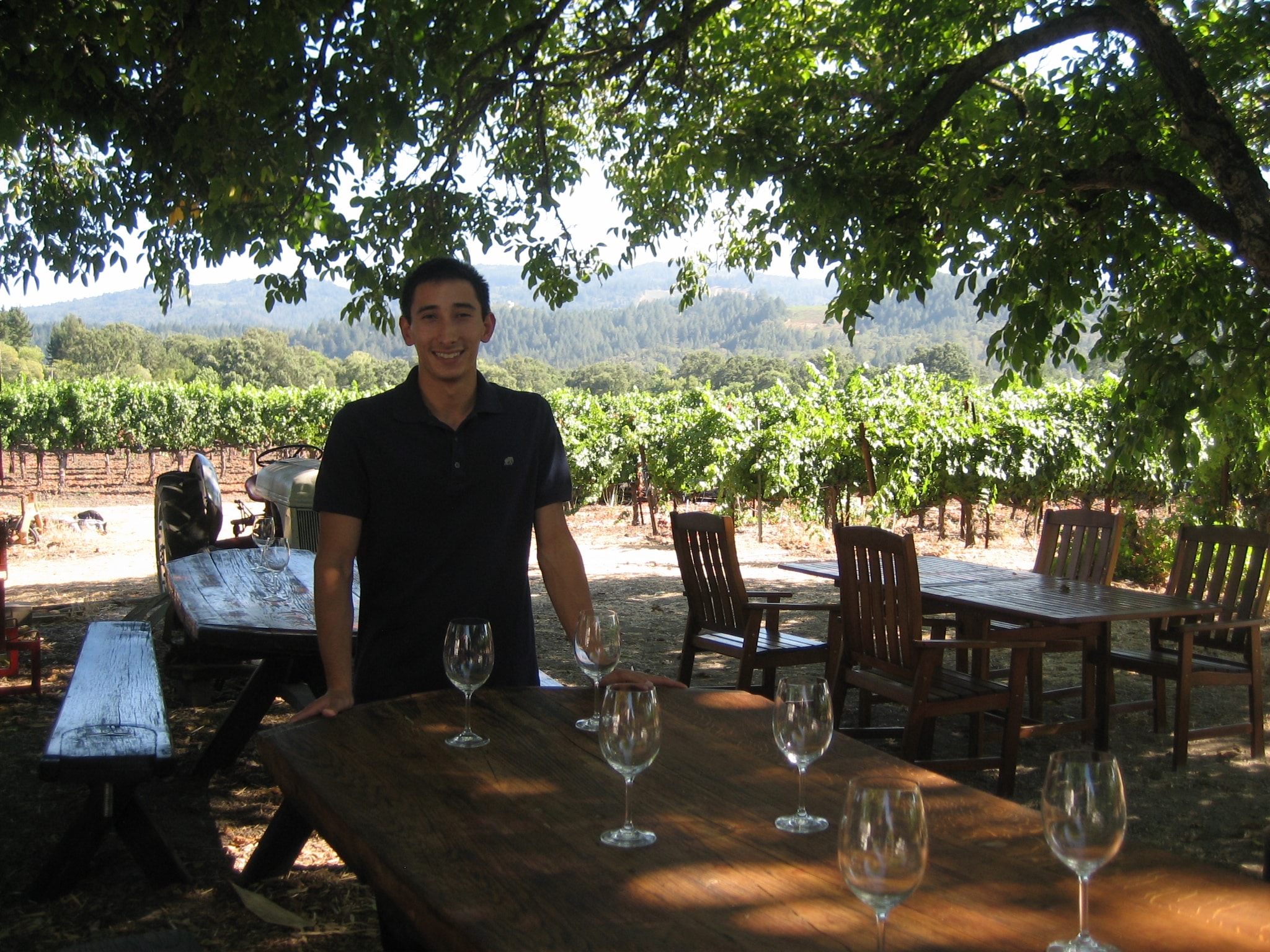 Emilio Tedeschi poses in the winery's lovely outdoor seating area